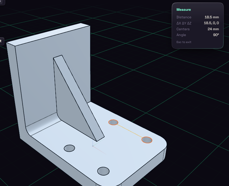 Measure panel showing the distance and angle between two hole edges